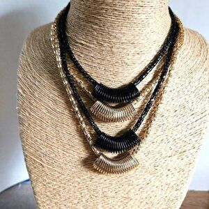 Black and Gold Metal Coils on Goldtone  Black Chains Necklace
